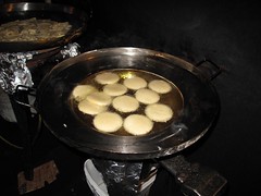 Gorditas cooking in the fryer