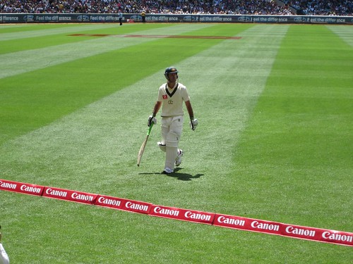 Ricky Ponting walks....and receives some helpful advice from Jack...