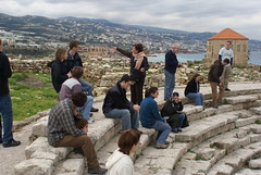 Students listen to the tour guide, Clare, as she speaks about the Byblos ruins.