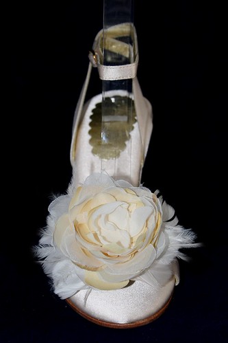 Atelier Shoes' ivory wedding wedges with specially designed flower accent