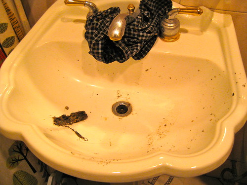 fixing the bathroom sink drain