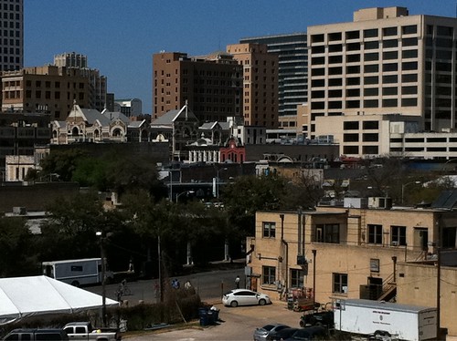 The Driskill amongst the Austin skyline