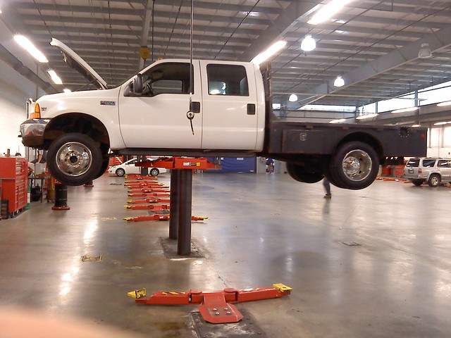 white ford shop truck lift diesel 1999 rack 73 flatbed f550 dually powerstroke