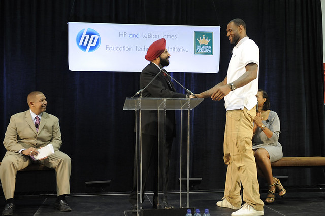 LeBron James and HP’s Satjiv Chahil shaking hands at the Boys & Girls Club of Miami-Dade