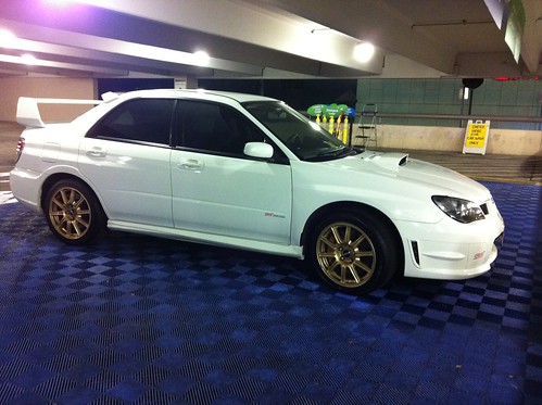 Looking to trade for some STI or evo ix 10 wheels with stock rubber on 
