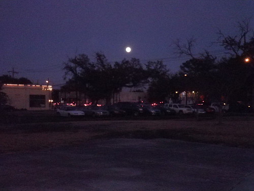 Full Moon over a perfect line of illegally parked cars