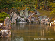 I want to lighten only the rocks around the waterfall without affecting the trees.