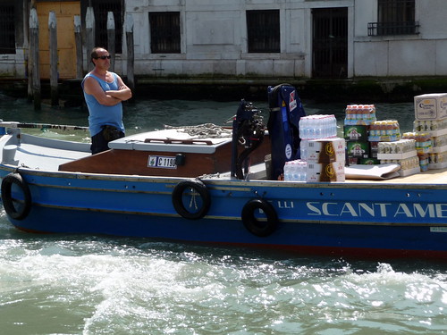 Transporting bottled drinks by water, Venice, Italy