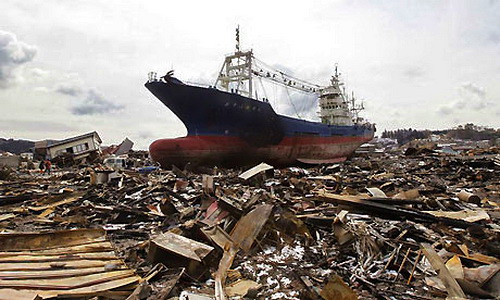 a ship washed inland by the tsunami in Kesennuma.