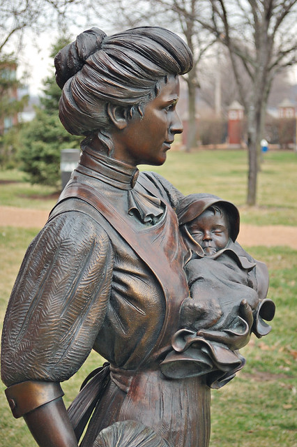 Bronze statue detail, "Tender Touch", by George W. Lundeen, at the Saint Louis University medical campus, in Saint Louis, Missouri, USA