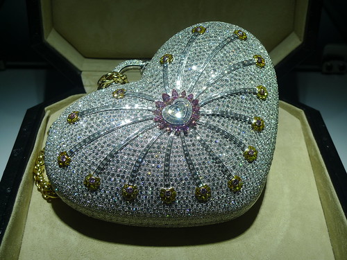 Ng carrying the RM 12 million purse dubbed'1001 Nights Diamond Purse'