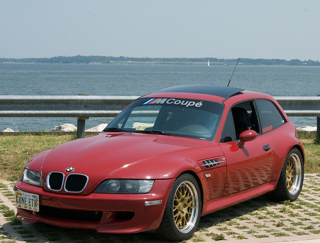 Imola Red Supercharged M Coupe with Gold Fiske FM-10 Wheels