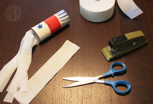 attaching streamers to paper tubes 