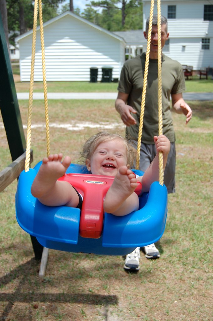 swinging makes her happy!