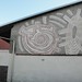Two suns; 1995. Graffito, cm 300x500.<br />
Maglione, Via Moncrivello.<br />
