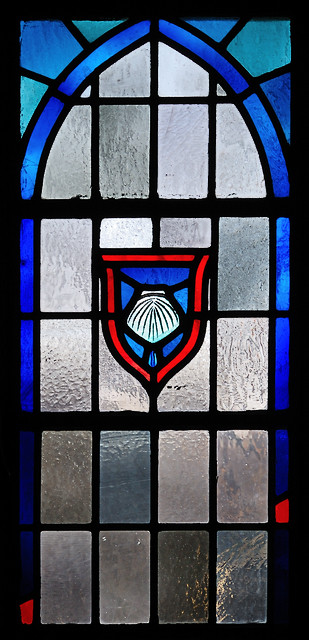 Saint Nicholas Roman Catholic Church, in Pocahontas, Illinois, USA - stained glass window of baptismal shell