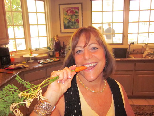 Lainey w/ a carrot from her garden