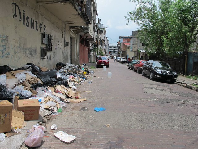 as forbidden as it is, the street is full of trash