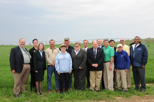  An Earth Day celebration of a public and private partnership to help protect and restore the Chesapeake Bay.  Pictured left to right:  Dick Sossi, representing Congressman Andy Harris; Linda Prohaska, representing Senator Barbara Mikulski; and, Lee Whaley, representing Senator Ben Cardin. The Dill Family: Kurt, Jane and Frank Dill. Representing USDA Rural Development: Cheryl Cook, Deputy Under Secretary and Jack Tarburton, State Director.  Kent County Representatives: Wayne Morris, Director Public Works and Ronald Fithian, President, County Commissioners.  State Officials: Buddy Hance, Secretary Maryland Department of Agriculture and Jay Sakai, Director Water Management Administration Maryland Department of the Environment.  Wickes Westcott, Chair, Kent Soil & Water Conservation District.  USDA Officials: Charles Cawley, State Executive Director, Farm Service Agency and Jon Hall, State Conservationist, Natural Resources Conservation Service. (wheat is currently growing in the field that will receive the land application of treated wastewater.)