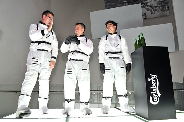 Carlsberg senior management team in astronaut suits at the relaunch event