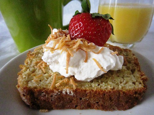 Slice of bread with cream and strawberry, take one