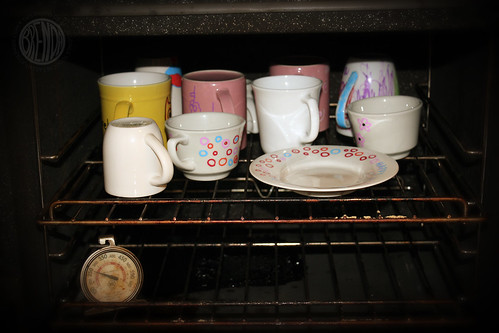 baking mugs and plate in oven 
