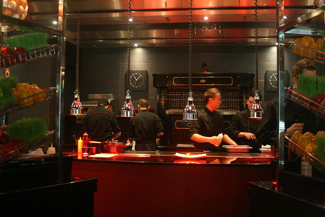 L'Atelier de Joël Robuchon features an open kitchen where you can watch chefs prepare your meal right before your eyes