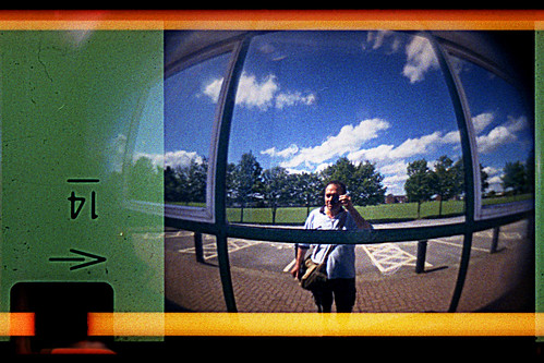 reflected self-portrait with Demekin 110 Fisheye camera by pho-Tony