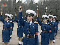 Pyongyang Traffic Girls
practicing their baton wielding
skills at the trafficgirl acadamy