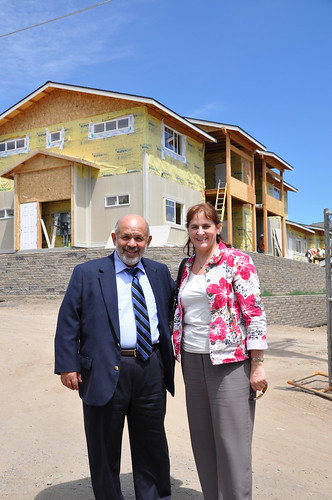 Deputy Undersecretary for Rural Development Victor Vasquez with USDA Rural Development Vicki Walker at the site of a USDA-funded housing facility for central Oregon farm workers.