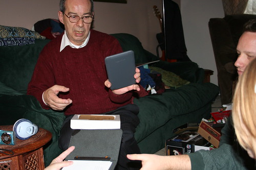 12/25/10: Grandpa gets a Kindle for his travels.