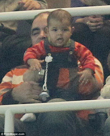 Ronaldo's Baby Watches Soccer. Guanabee / 13th Dec 2010. Cristiano Ronaldo Jr. (Foto tirada durante a partida Real Madrid vs Auxerre,