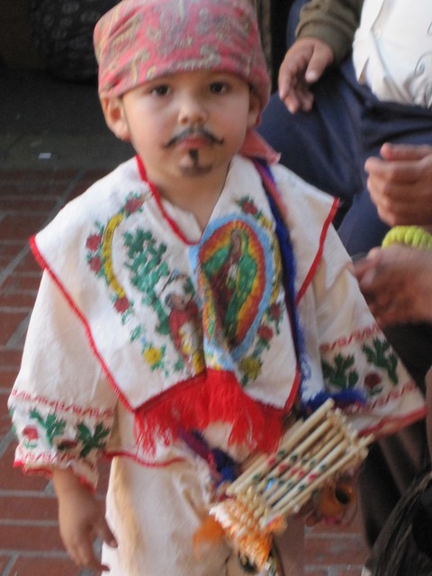 Toddler boy at La Virgen de Guadalupe festivities, Olvera St