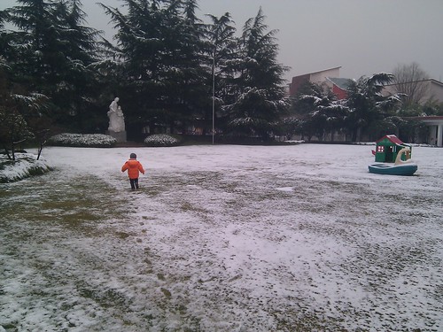 Scott running in the snow at Soong Ching Ling Kindergarten