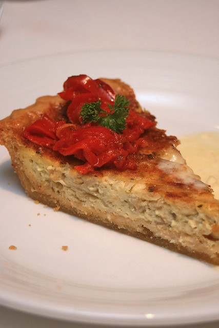 Vidalia Onion Tart: sweet Vidalia onions combined with nutty Gruyère cheese, baked in a buttery crust, served with leek fondue and sauteed red peppers