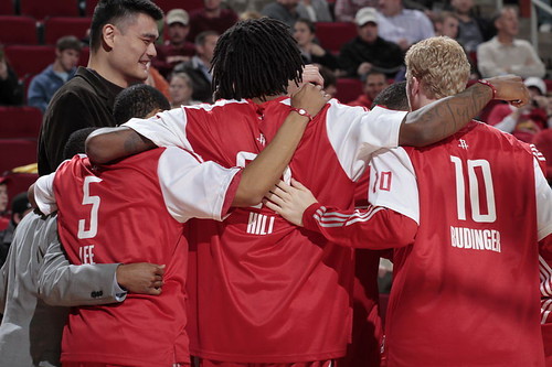 December 27th, 2010 - Yao Ming joins his teammates in a pre-game huddle