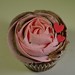 Two-tone 'rose' effect swirl cupcake, adorned with two little fondant hearts