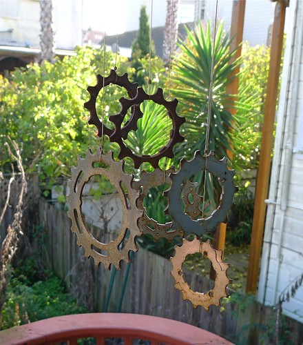 Bicycle cog wind chimes with rusty patina