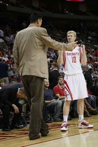 November 24th, 2010 - Yao Ming offers some strategic advice during a timeout against the Warriors