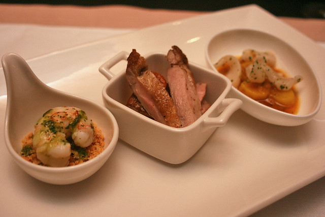 Langoustine with sofrito and migas, quail with foie gras escabeche, and razor clam stew