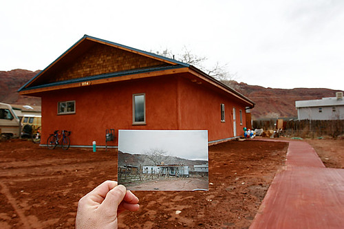 The finished home with a photo of the trailer it replaced (foreground) 