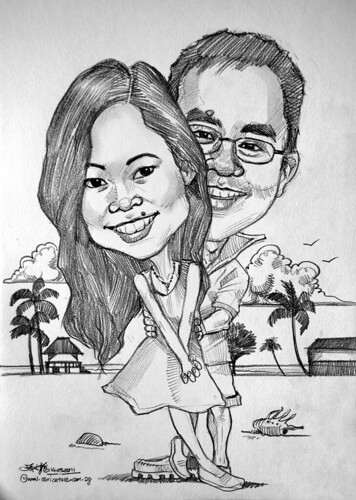 Couple caricatures at Malaysia beach