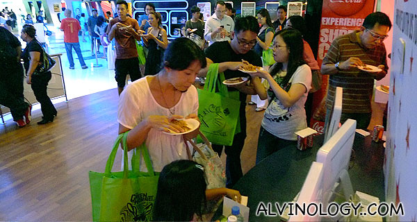 Guests enjoying the free flow of pizzas from Domino's
