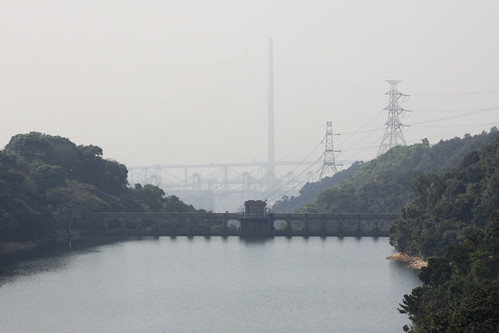 Kowloon Byewash Reservoir, the Stonecutters Bridge is the massive tower in the background, the cranes are at the Kwai Tsing Container Terminals