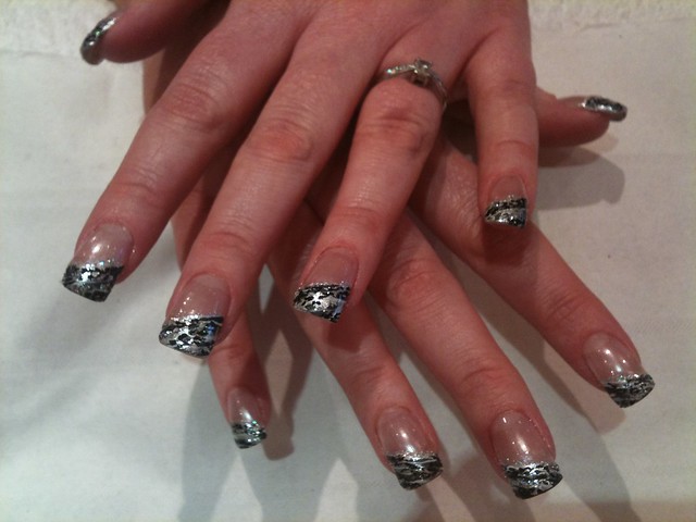 Silver and charcoal leopard nail art