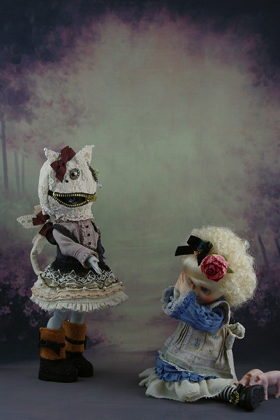 Cheshire and Alice