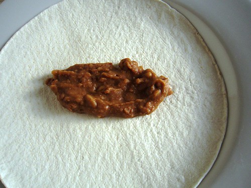 Start with beans on tortilla