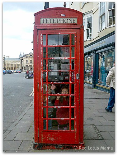 Princess D and Terror trapped in a red phone booth in Oxford. #UK2011trip