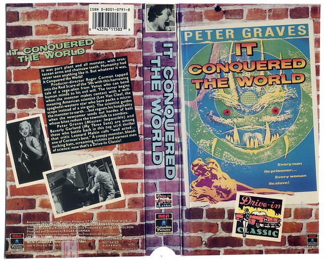 In Conquered the World (VHS Box Art)