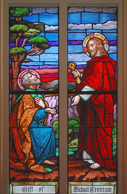 Saint Joseph Roman Catholic Church, in Louisiana, Missouri, USA - stained glass window detail of Jesus giving the keys of the kingdom to Saint Peter